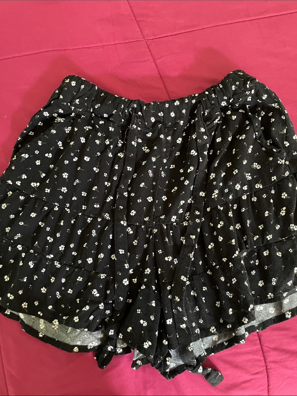 SO high rise shorts black with white flowers and flair at the bottom size small